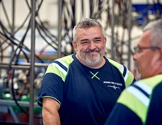 Glad medarbejder på Strandmøllen snakker om værdier på arbejdsplads. Om Strandmøllens mission og vision. 